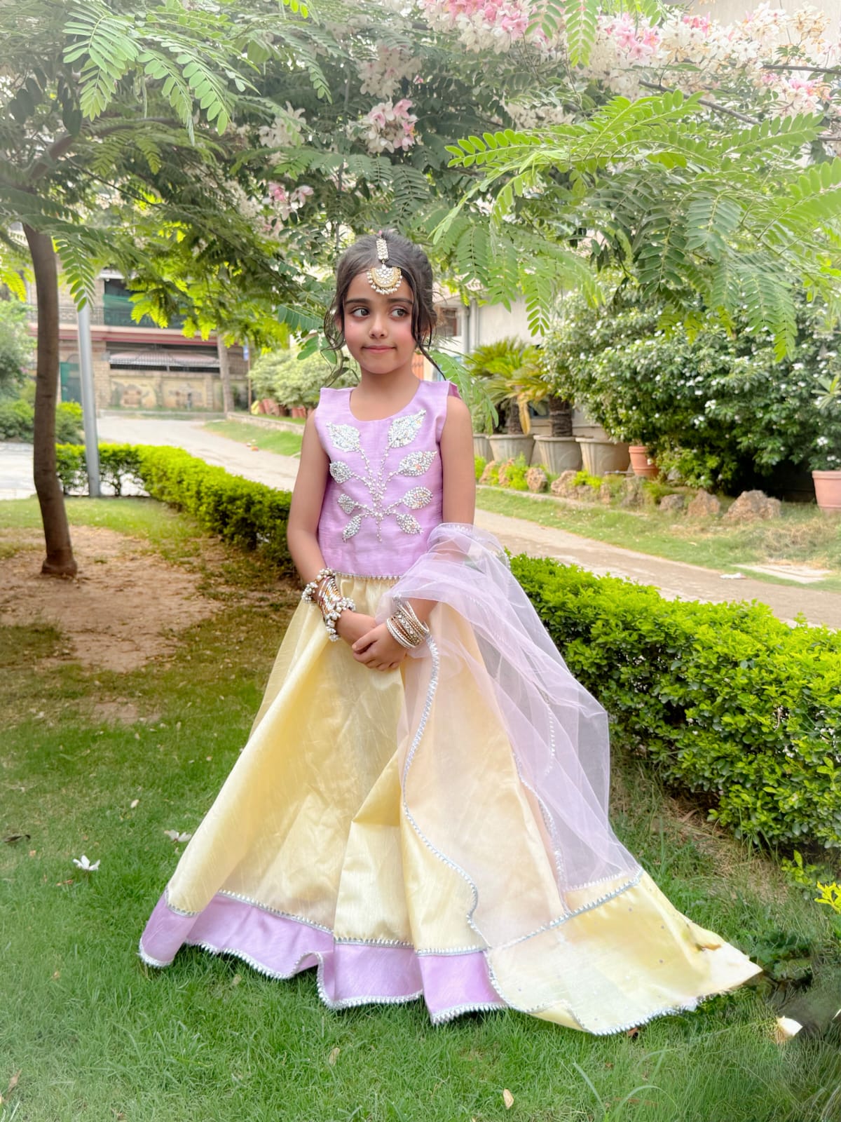 A dreamy lilac and lemon yellow lehenga